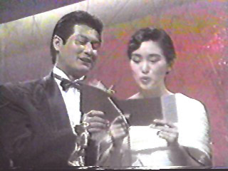 Alan Tang and Gong Li