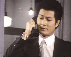 Tang on phone